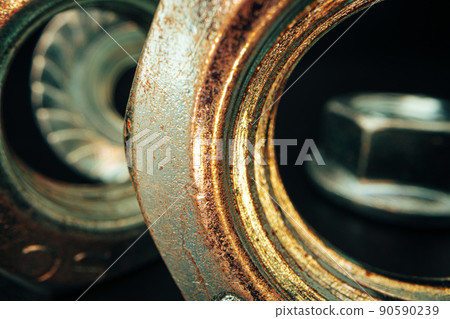 Metal nut on black background close up 90590239