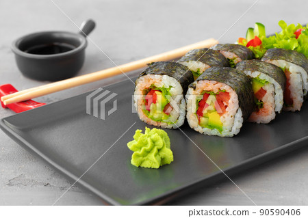 Vegeterian sushi roll with vegetables on stone plate Vegeterian sushi roll with vegetables on stone plate 90590406