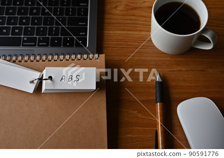There is a word book with ABS written on the desk. Abbreviation for Asset Backed Security in financial terms There is a word book with ABS written on the desk. Abbreviation for Asset Backed Security in financial terms 90591776
