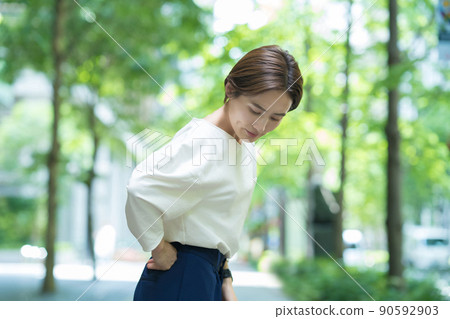 A woman who cares about back pain A woman who cares about back pain 90592903