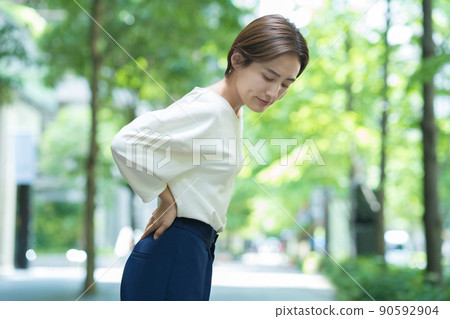 A woman who cares about back pain 90592904