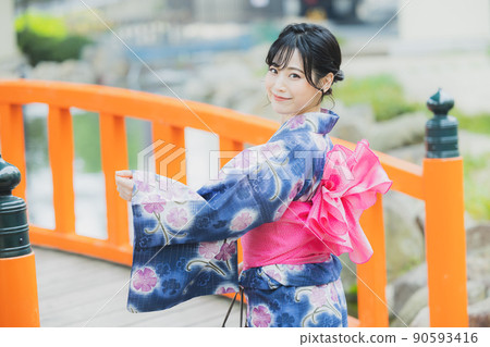 A woman in a yukata 90593416