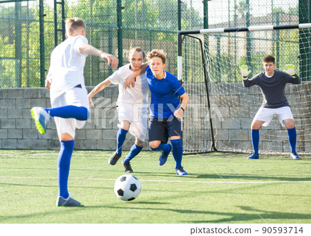 Young football players fighting for ball 90593714