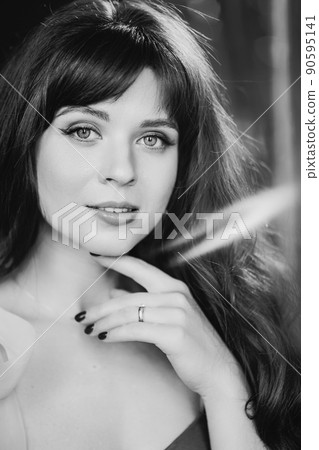 beautiful and delicate portrait of a young woman. vitamins and cosmetics. 90595141