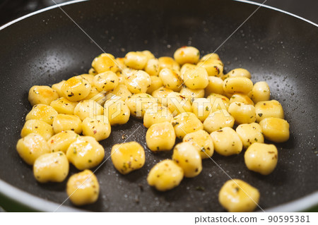 Delicious gnocchi made from potatoes in the Italian style are prepared Delicious gnocchi made from potatoes in the Italian style are prepared 90595381
