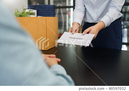 Resignation concept, Female employee sending resignation letter to boss when changes to new job 90597032