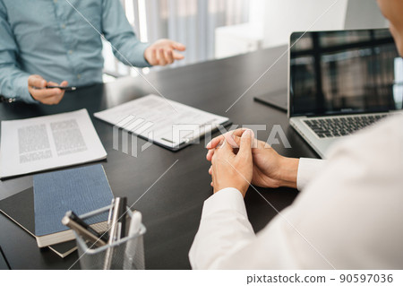 Recruitment concept, Male applicant explaining about profile and work experience to employer Recruitment concept, Male applicant explaining about profile and work experience to employer 90597036