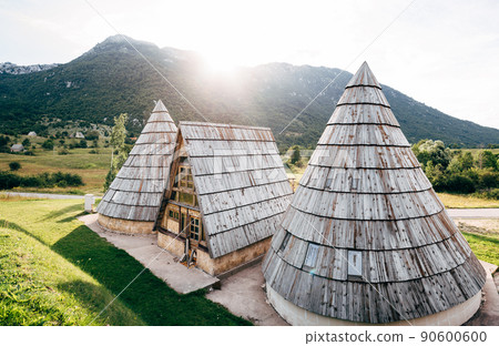 Triangular stone house between two conical buildings. Montenegro Triangular stone house between two conical buildings. Montenegro 90600600