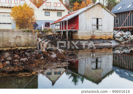 Norwegian fishing village view with wooden barns Norwegian fishing village view with wooden barns 90601618