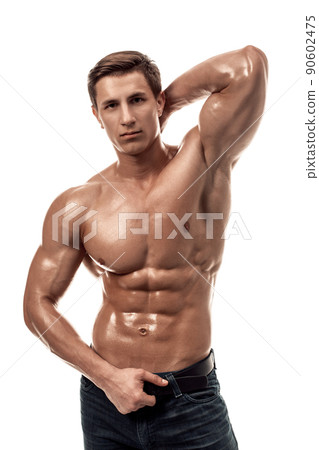 Muscular handsome young man with naked torso. Isolated on white background. 90602475