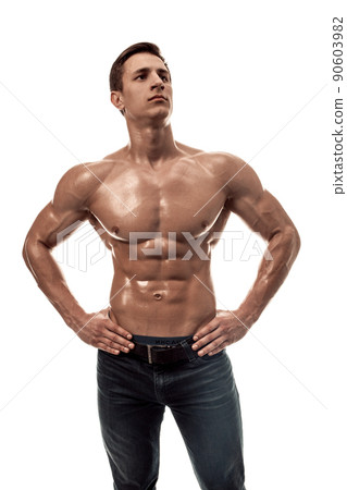 Muscular handsome young man with naked torso. Isolated on white background. Muscular handsome young man with naked torso. Isolated on white background. 90603982