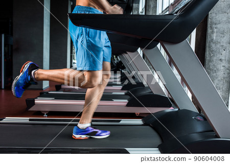 Legs running on the treadmill close up Legs running on the treadmill close up 90604008