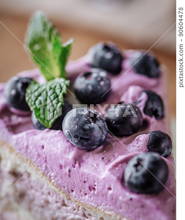 Closeup on slice of blueberry cake Closeup on slice of blueberry cake 90604478