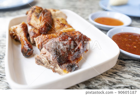 food and drink, grilled chicken on white plate food and drink, grilled chicken on white plate 90605187