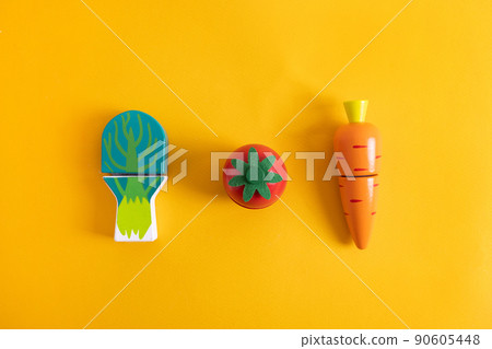 Food toys set on yellow background. Creative wooden design, vegetarian vegetable. Child development. Kids play. 90605448