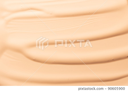 Makeup foundation background. Liquid foundation, concealer brush strokes and face powder. Makeup base, BB, CC cream texture 90605900