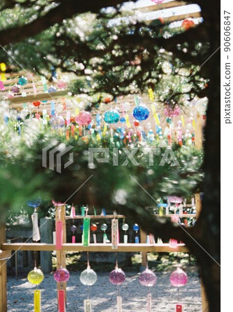 Pine trees and wind chimes 90606847