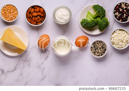 Products rich in calcium on dark background. Products rich in calcium on dark background. 90607235