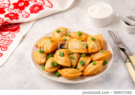 Dumplings, filled with mashed potatoes. Dumplings, filled with mashed potatoes. 90607260