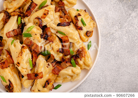 Dumplings, filled with mashed potatoes. 90607266