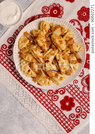 Dumplings, filled with mashed potatoes. 90607271