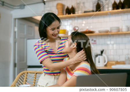 LGBT asian lesbian couple love moments happiness at home concept 90607805
