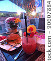 Smoothies burger and flowers in the diner 90607884