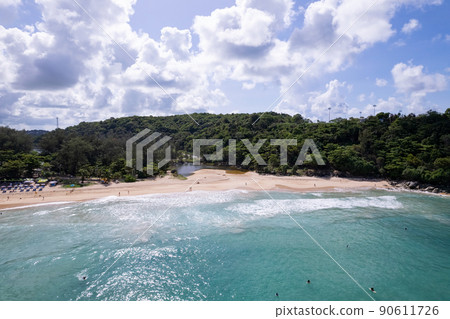 Aerial view of sea crashing waves White foaming waves on sandy shore. Top view beach in Phuket Thailand Aerial view of sea crashing waves White foaming waves on sandy shore. Top view beach in Phuket Thailand 90611726