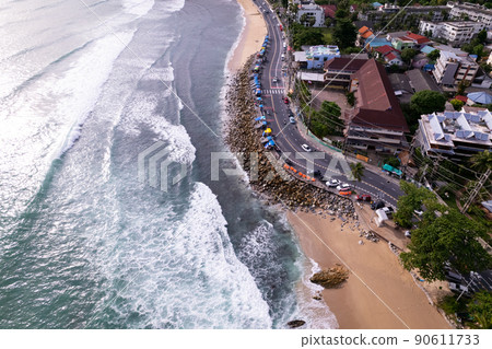 Crashing waves on beach at Kalim beach Phuket Thailand in June 5- 2022 Amazing beach beautiful sea in andaman sea Aerial view Drone camera High angle view 90611733