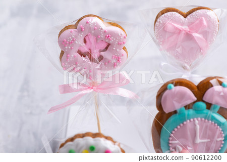 Set of colorful and sweet cookies on a stick 90612200