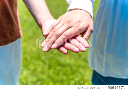 Couple holding hands parts cut Couple holding hands parts cut 90612371