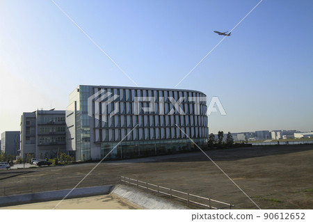 Passenger plane taking off over King Sky Front PeptiDream 90612652