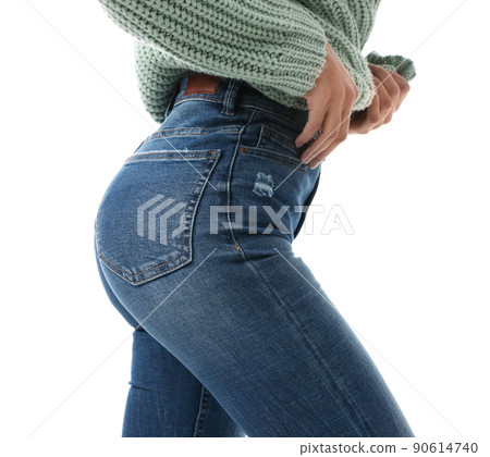 Woman wearing jeans on white background, closeup Woman wearing jeans on white background, closeup 90614740