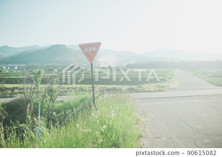 Nostalgic countryside landscape and stop sign Nostalgic countryside landscape and stop sign 90615082