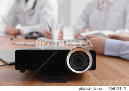 Video projector on table during medical conference Video projector on table during medical conference 90615145
