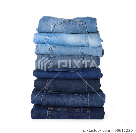Stack of different jeans isolated on white 90615220