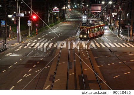 Asukayama intersection at night and Toden-Arakawa line 90618456