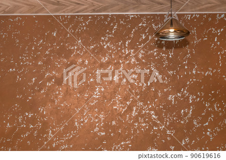 Pendant lamp in glass frame light on the ceiling in modern interior design with plastered brown wall background Pendant lamp in glass frame light on the ceiling in modern interior design with plastered brown wall background 90619616