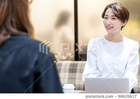Middle-aged woman consulted in the office break space 90620617