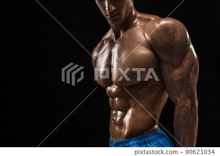 Part of a man's body on a dark background with copyspace 90621034