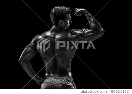 Strong Athletic Man Fitness Model posing back muscles, triceps o 90621152