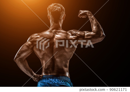 Strong Athletic Man Fitness Model posing back muscles, triceps o 90621171