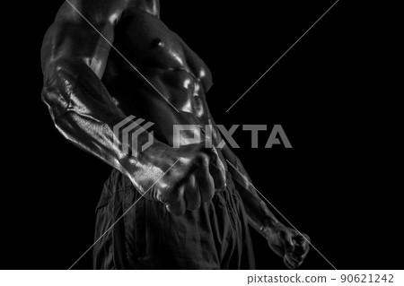 Part of a man's body on a dark background with copyspace 90621242