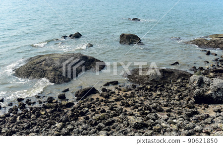 Big rock at beach, Nature background Big rock at beach, Nature background 90621850