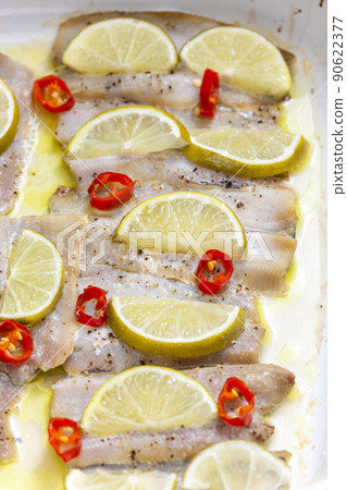 baked cod fish with lemon and chilli baked cod fish with lemon and chilli 90622377