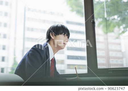 High school boys taking classes at a prep school High school boys taking classes at a prep school 90623747