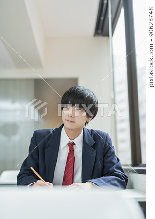 High school boys taking classes at a prep school High school boys taking classes at a prep school 90623748