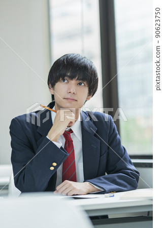 High school boys taking classes at a prep school High school boys taking classes at a prep school 90623750