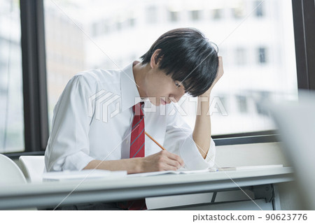 High school boys taking the exam 90623776