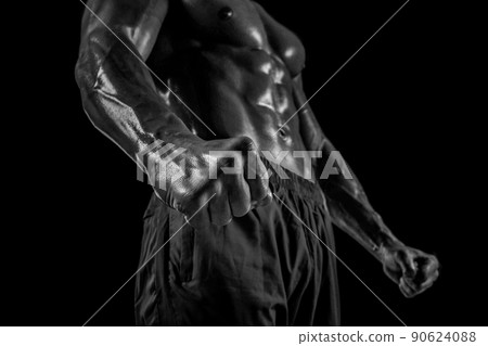 Part of a man's body on a dark background with copyspace Part of a man's body on a dark background with copyspace 90624088